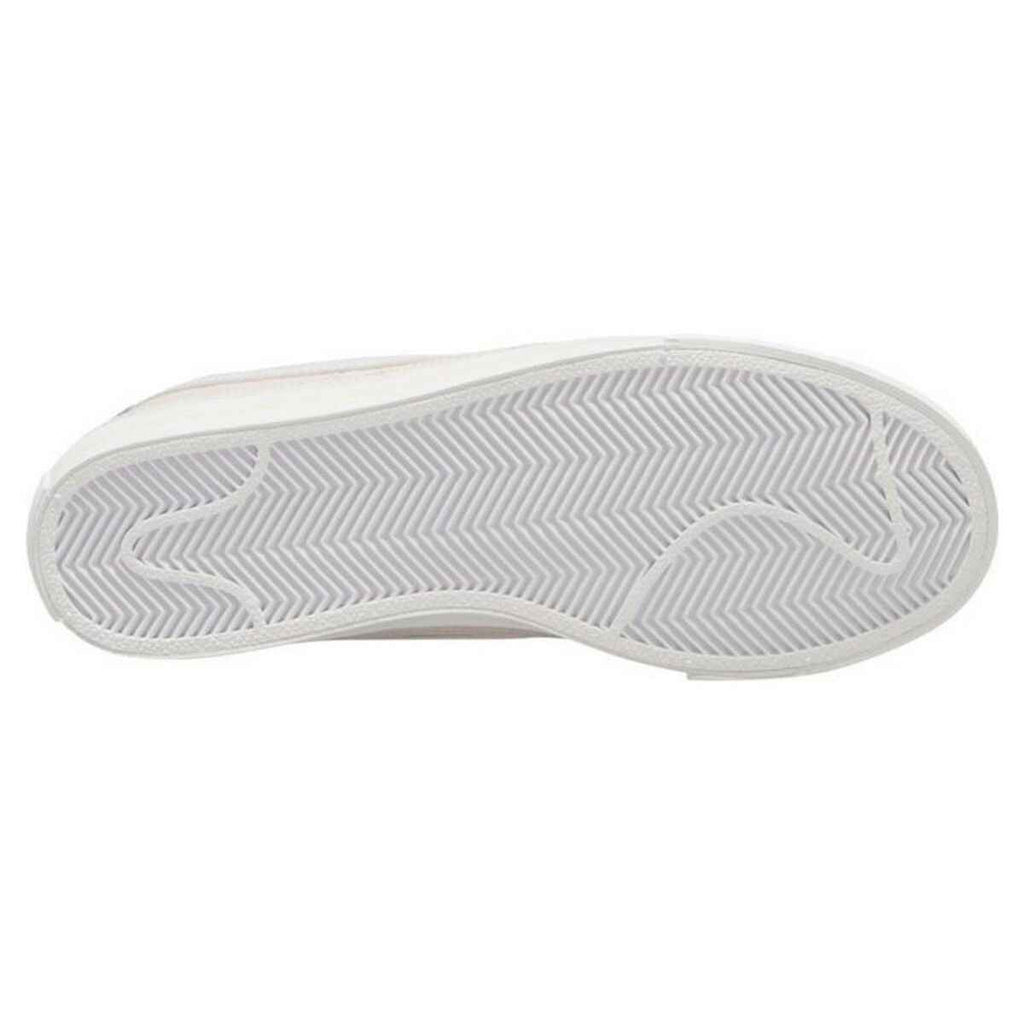 Bottom sole of Nike Court Legacy W trainers for women in yellow