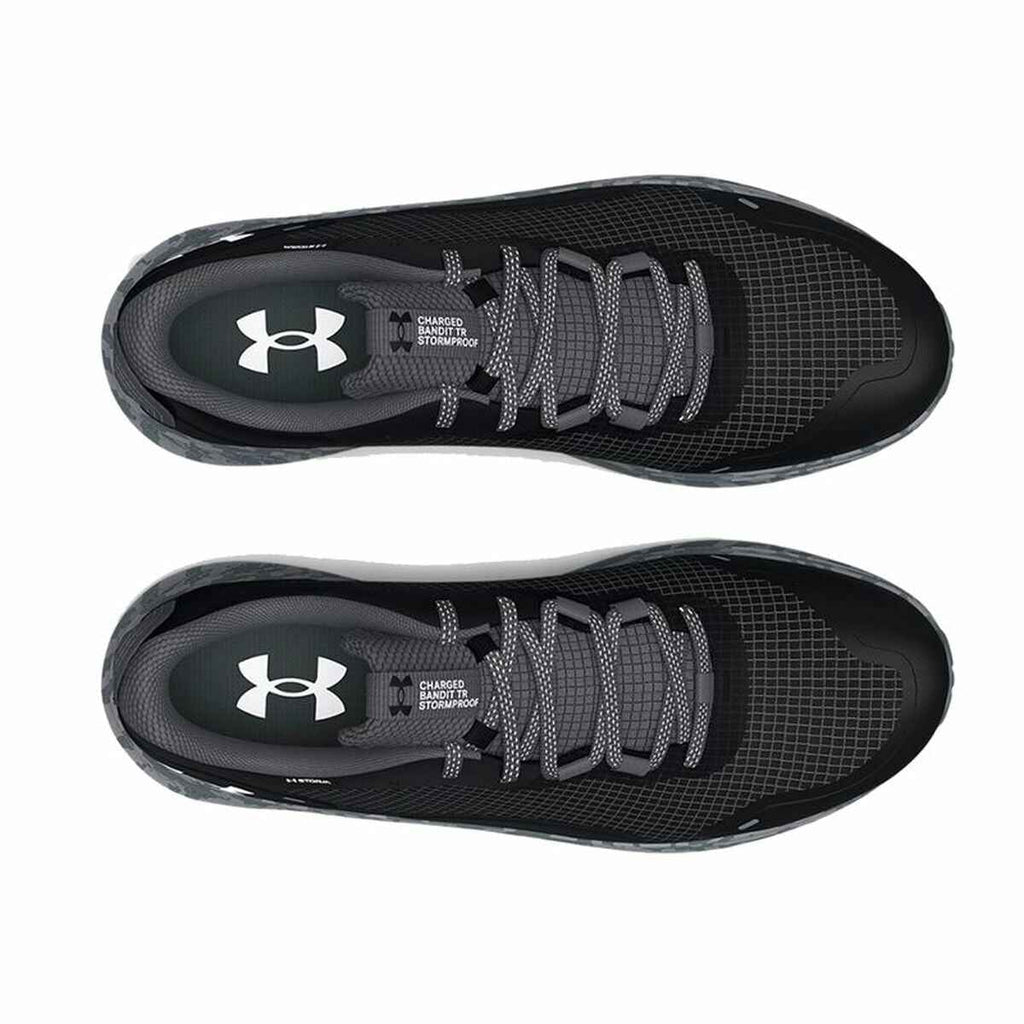 Top view of a pair of black Under Armour Charged Bandit running shoes for men with dark grey accents.