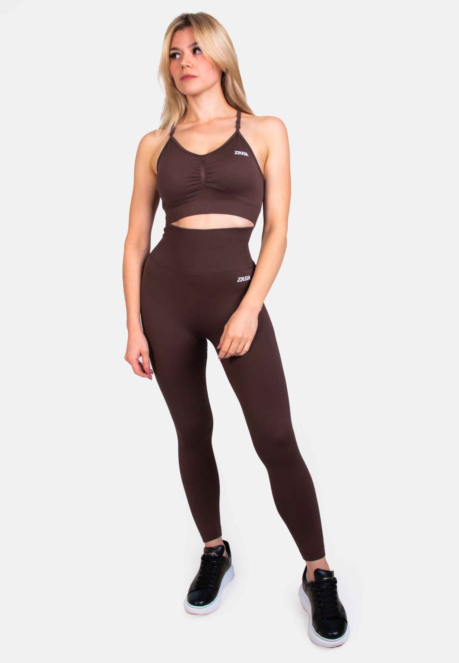 Shape Seamless Sports Bra with removable pads and adjustable straps paired with high-waisted brown leggings.